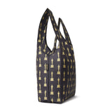 Side view of the black with all-over gold oscar statuette print nylon shopping bag