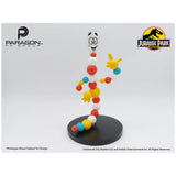 Colorful character figure on a stand with Paragon FX Group and Jurassic Park logos. Jurassic Park Mr. DNA Authentic Movie Prop Replica at The Academy Museum Store Los Angeles