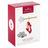 Hallmark Keepsake Christmas ornament packaging for Ruby Slippers from The Wizard of Oz, featuring a red box with white and gold accents.
