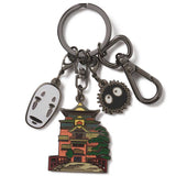 Keychain with character charms and a temple design on a white background. Studio Ghibli Spirited Away Exclusive Keychain 