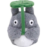 Plush toy of a character with a green leaf on a white background. Embrace the cuteness of Totoro with this 4-inch bean bag plush! Perfectly soft and officially licensed, it's an ideal collectible for Studio Ghibli enthusiasts.