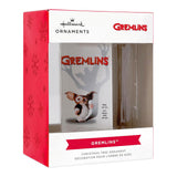 Hallmark Gremlins Christmas ornament packaging with red and white design.