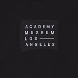 Black patch with 'Academy Museum Los Angeles' text on a black background