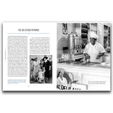 Book page with black and white photograph of a person in a kitchen and text on a white background