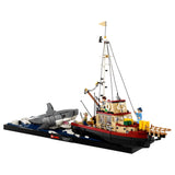 LEGO model of a fishing boat with a shark on a white background Jaws (1975) 50th Anniversary Lego Set
