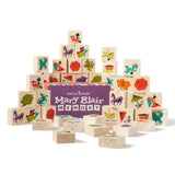Wooden blocks with colorful designs and 'Uncle Goose Mary Blair Memory' packaging on a white background