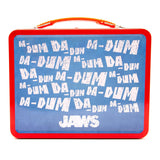 Tin lunch box with 'Jaws' text design on a blue background