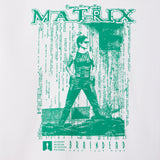 Green 'Matrix' design with the movie character Trinity standing featuring the Academy Museum of Motion Pictures logo.