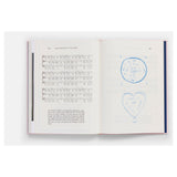 Open book with musical notation and heart illustrations on a white background