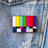 Color test pattern pin on a denim background
