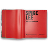 Open book with 'Spike Lee' title on a red background