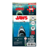 Jaws puzzle packaging with shark image and text on a white background