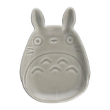 Gray ceramic dish shaped like a Totoro with ears on a white background